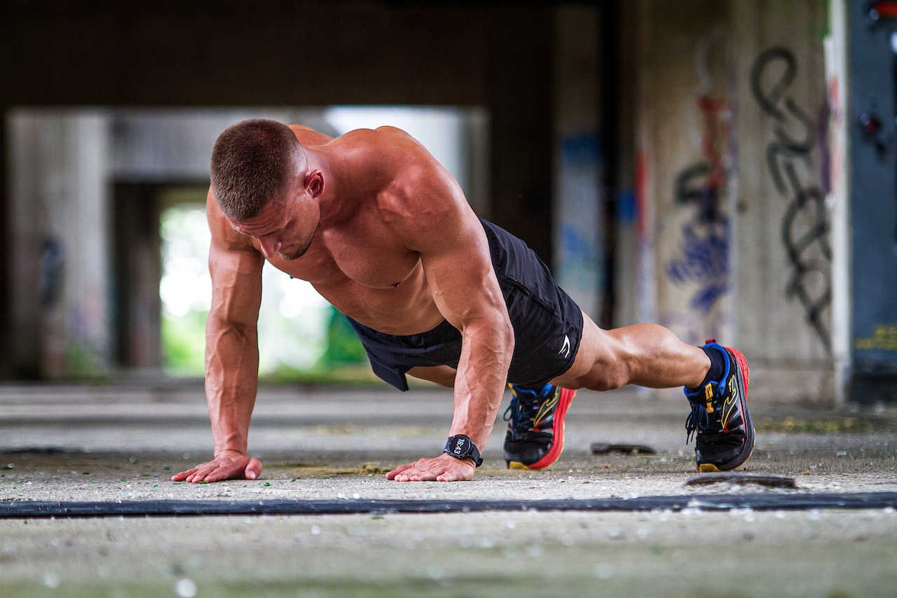 How do hormones impact men's fitness?